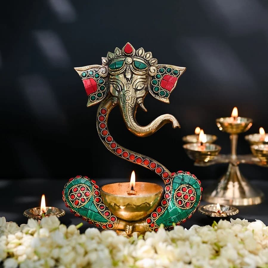 Brass Ganesha Face with Curved Trunk Diya & Stone Work