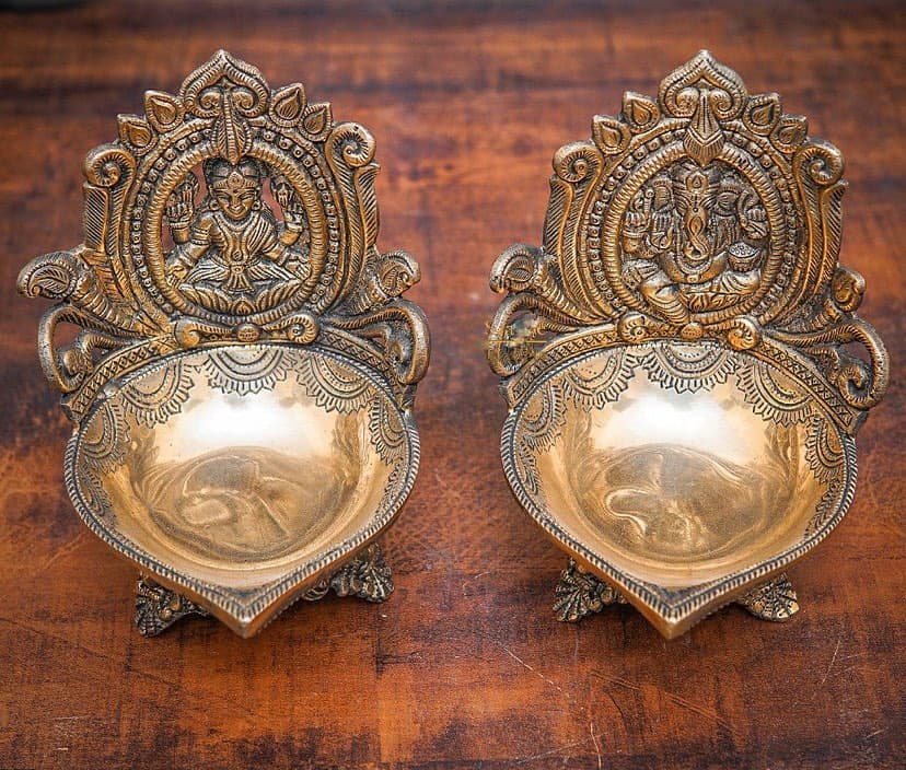 Brass Lakshmi & Ganesha Diya – Pair with Figurine Backpiece